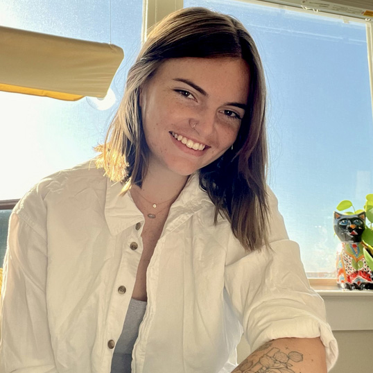 Elissa Jorgensen in front of a window.