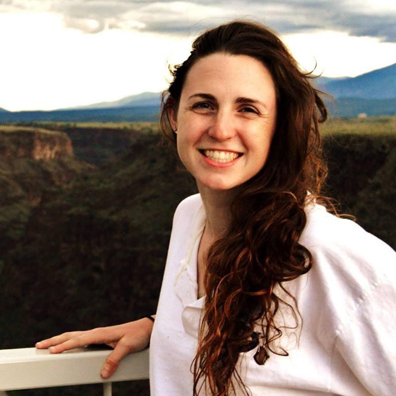 Haley McLeod stands in front of a canyon.